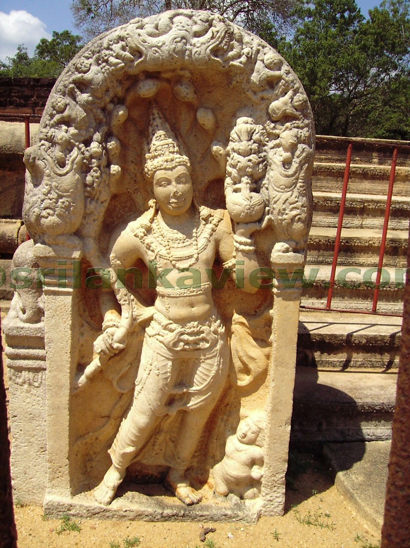 Guardstone at Ratnapasada Entrance. It shows a Naga king holding a vase symbolizing the prosperity.