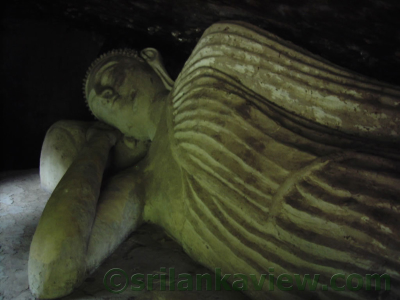 The reclined Buddha figure found inside the cave.