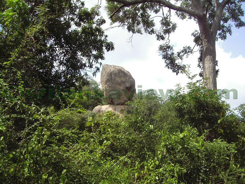 There is a path to go near to the balancing rock.