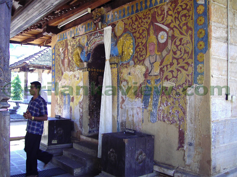 A devotee leaving the Temple Shrine chamber after worshipping, Natha Temple, Kandy