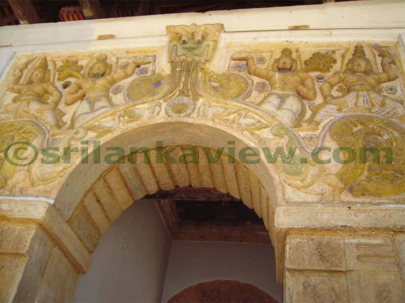 Detailed sculpture work on stone, Entrance arch, Natha Temple,Kandy