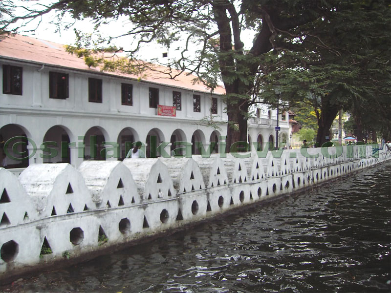 Stone retaining wall built at the side of the present Queens Hotel.The "Diyareli Bemma' or the Wave Swell Wall is built on top of it seen here in white colour.
