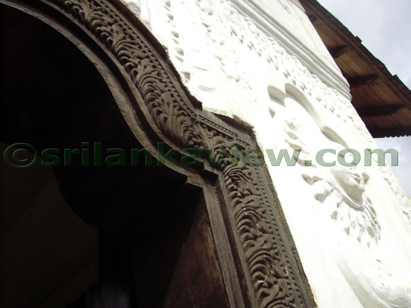Arch of the Door way made of timber.