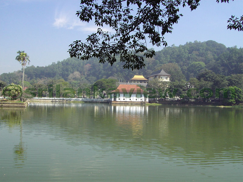 View from across the Kandy lake with a view of the bathing pavillion.