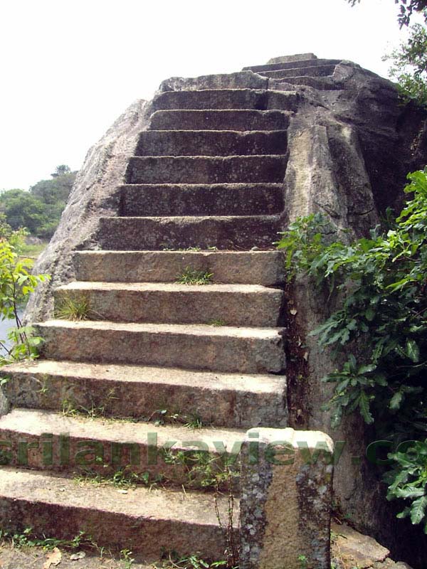 Stone steps cut in to the rock boulder of the slanting rocks