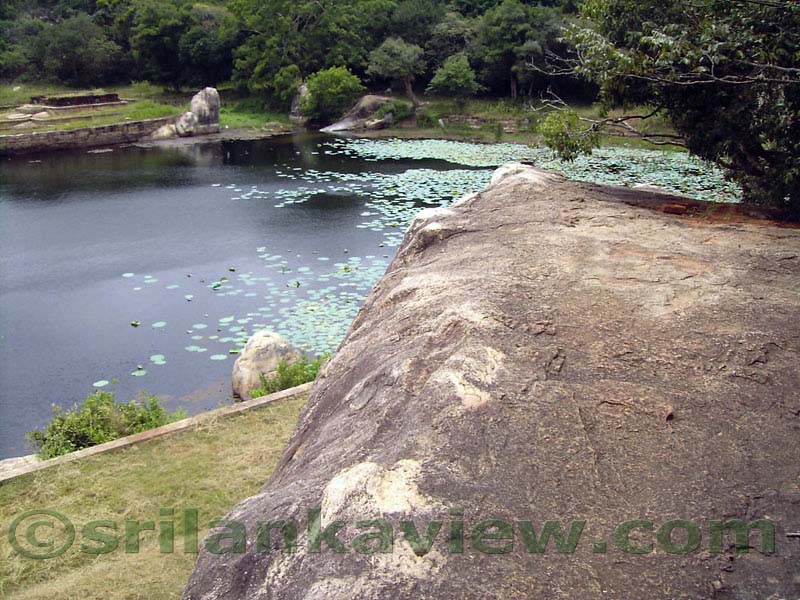 There had been a building on top of this rock in earlier times.,Kalu Diya Pokuna