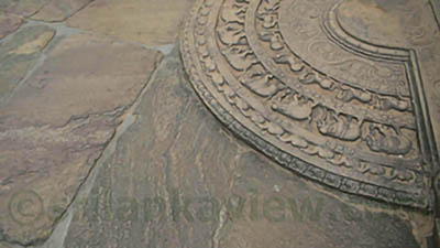  Moonstones are semi-circular stone slabs that represent the transition from the profane world to the sacred. The moonstones at the Polonnaruwa Vatadage feature intricate carvings of animals, plants, and mythological creatures.
