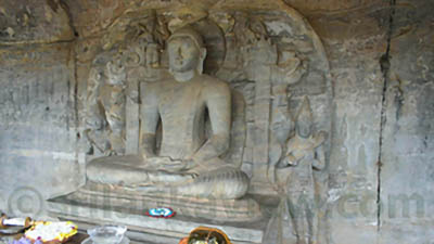 Gal Viharaya seated buddha statue inside the cave
