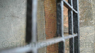Paintings at Gal Viharaya seated buddha statue inside the cave