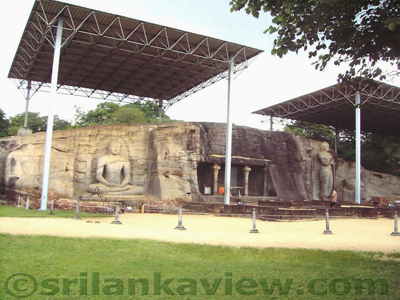 The Buddha Statues are now protected by a High roof at Gal Viharaya. In earlier times, all these images were covered by a brick building where the foundations are still to be seen with facility for roof timber is seen carved as sockets in to the rock face.