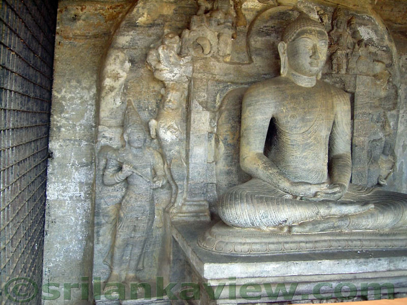 The Samadhi Buddha statue in the 'Nisinna Patima Guha' on a throne . 