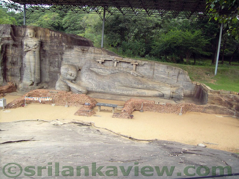 The Buddha statues as seen from the rock in front.
