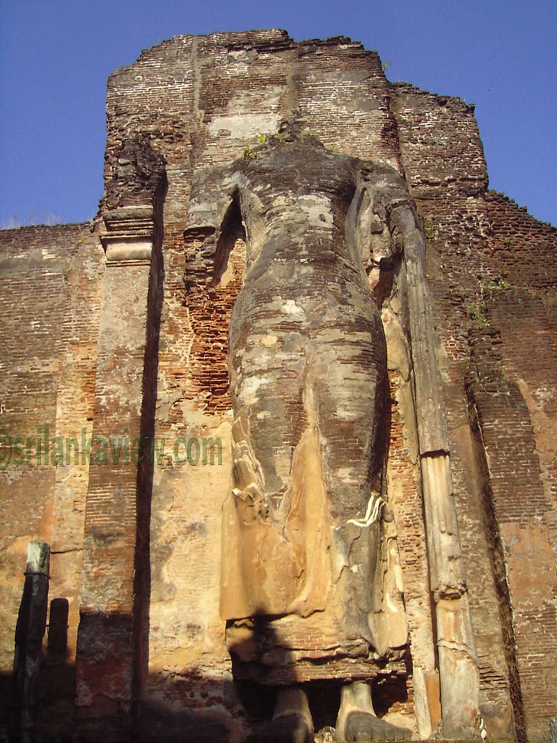The remains of the colossal standing Buddha image finely sculptured with brick and coating of stucco.