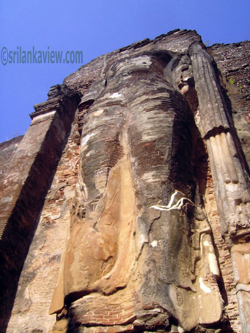 The remains of the colossal standing Buddha image finely sculptured with brick and coating of stucco.
