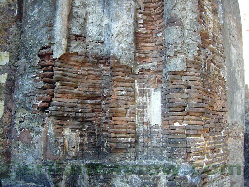 Closeup photo of the brick work of the Buddha image.