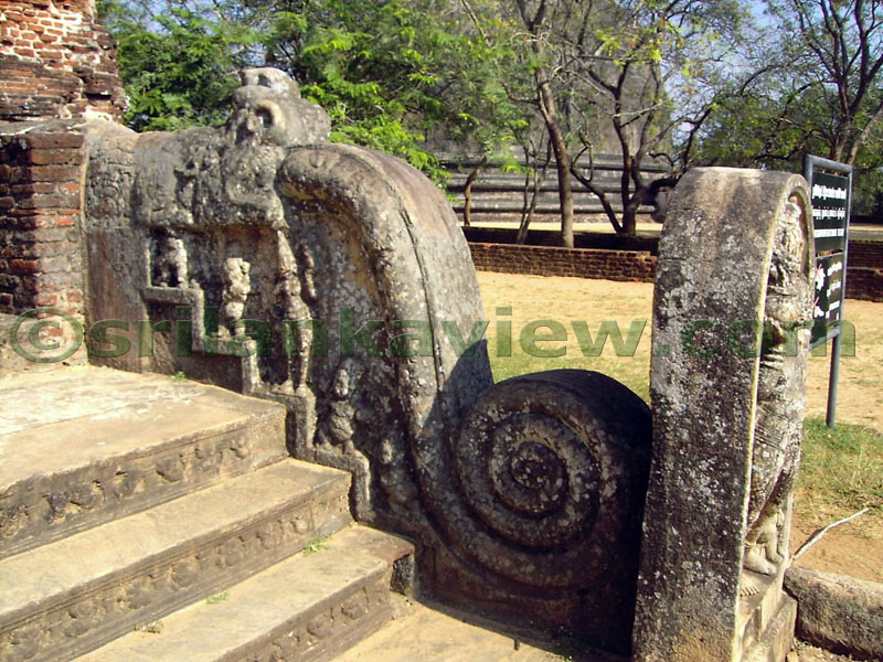 The decorative stone entrance with Guardian figures and closeup details of one of the balustrades.