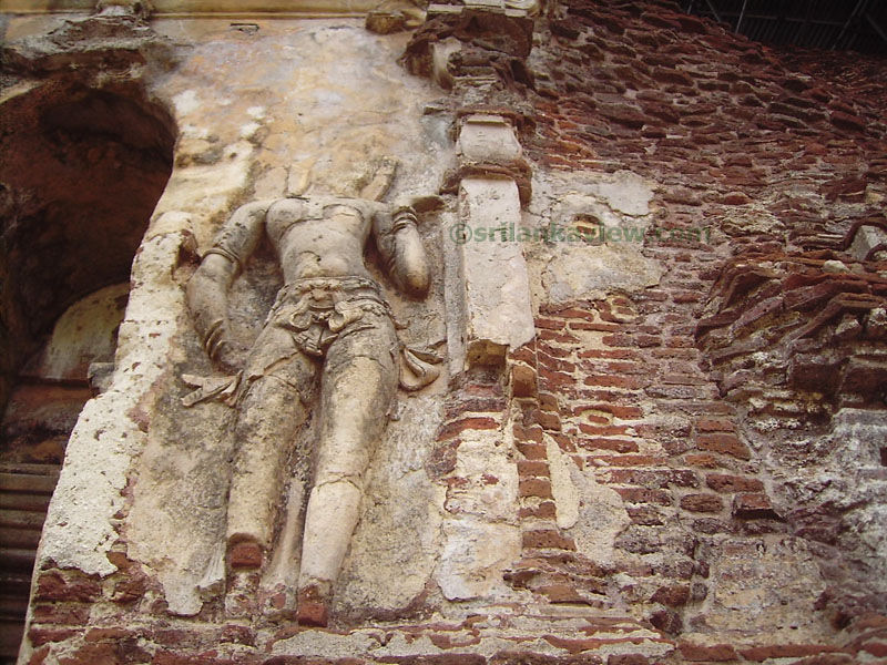 A guardian figure at Door entrance,Tivanka Pilimage, Polonnaruwa.