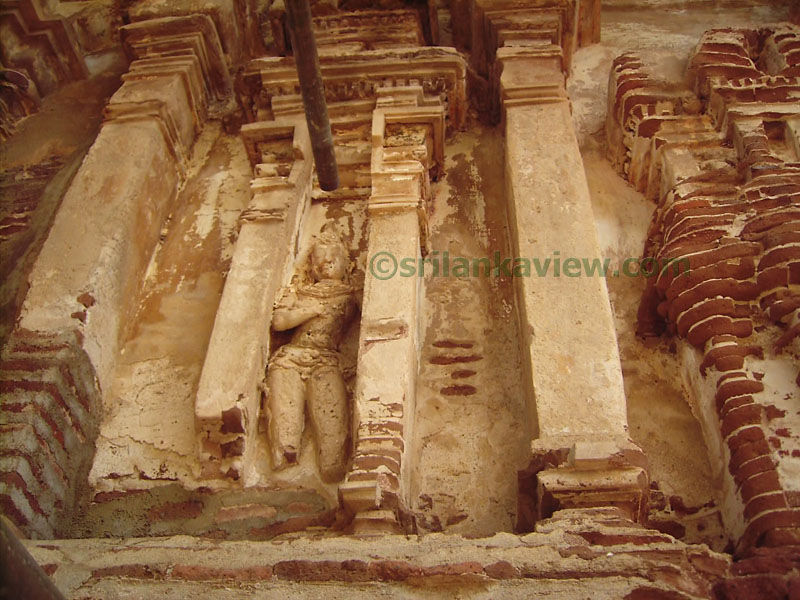 Figures of Buildings sculptured on outer walls. Tivanka Pilimage, Polonnaruwa.