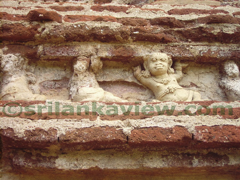 Well preserved Dwarf figure at Tivanka Pilimage, Polonnaruwa.