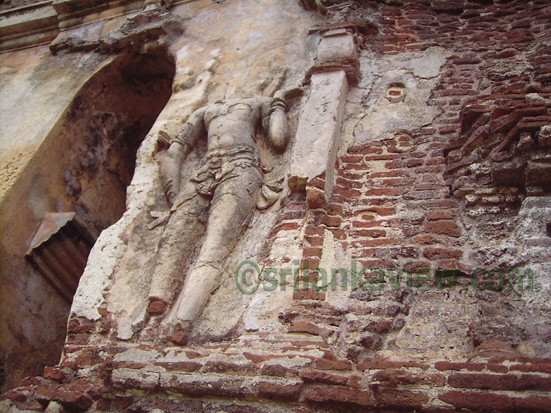 Arched doorway and the Guardian, Tivanka Pilimage, Polonnaruwa.
