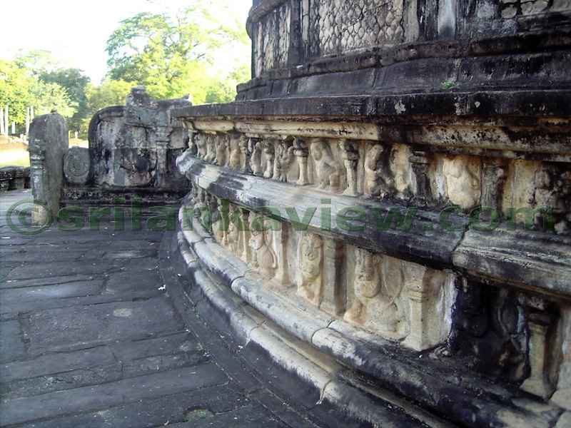 The carvings at the Circular portion of Vatadage. The entrance steps can also be seen. 