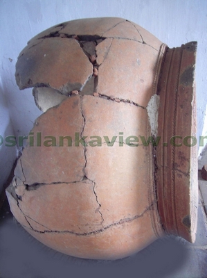 This Ancient clay pot has been found with inside filled with coins. This pot is about 3 feet in diameter.
