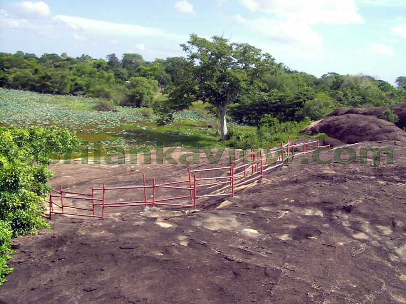 The inscriptions, the fence and the Galawewa tank.